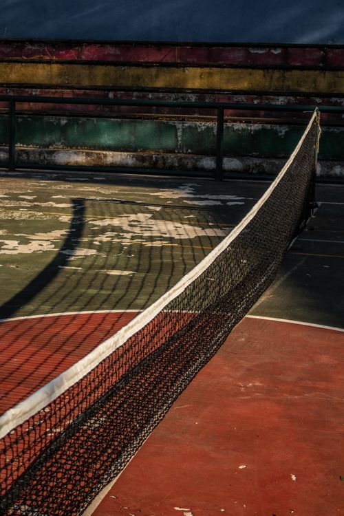 Free A scenic view of a vintage tennis court net on Heybeliada, Istanbul. Stock Photo