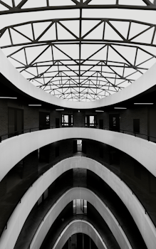 Striking black and white photo of a modern building's geometric interior.