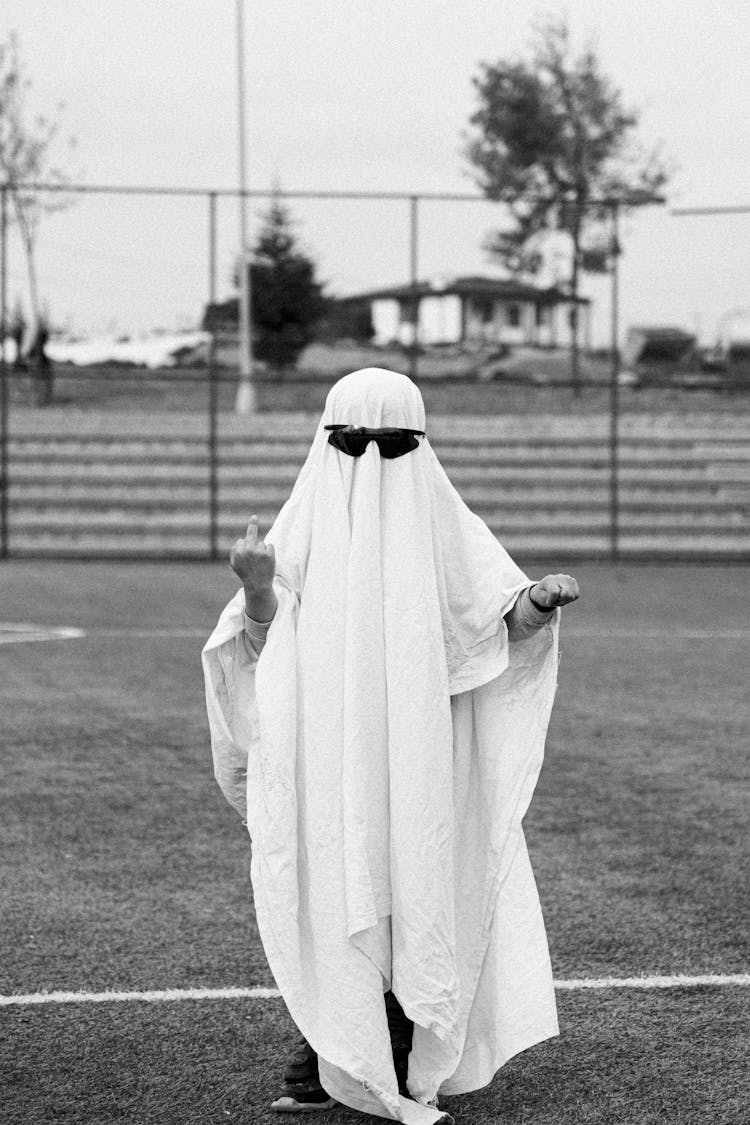 Person In White Cloth As Ghost On Stadium