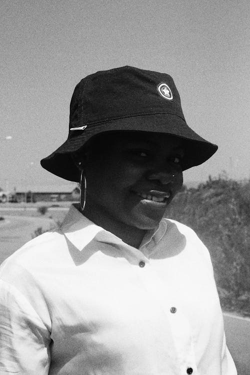 
A Woman Wearing a Black Hat