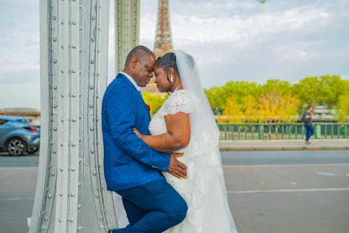 Photo of a Bride and a Groom Head to Head