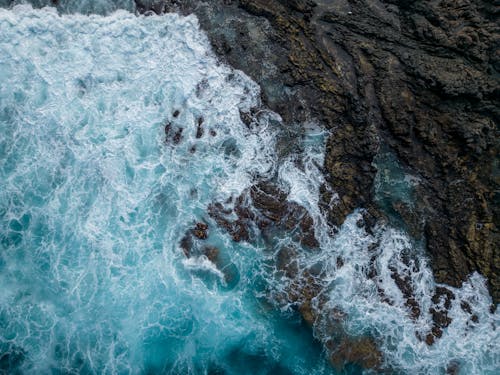 Drone Shot of Rocks Near the Sea