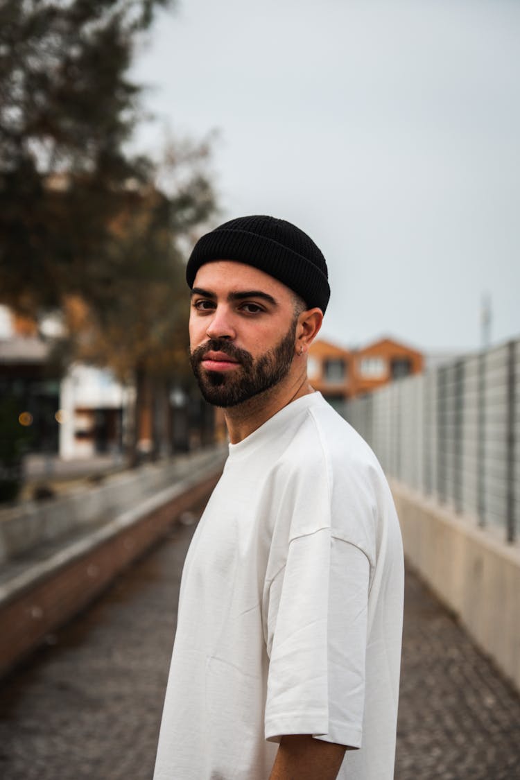 Portrait Of A Man With A Beard Wearing A White Shirt