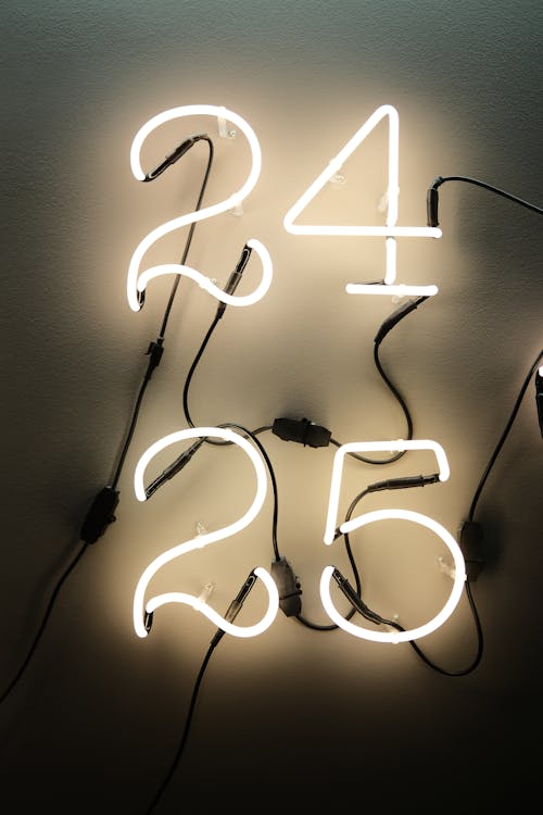 Illuminated Numbers on Studio Background