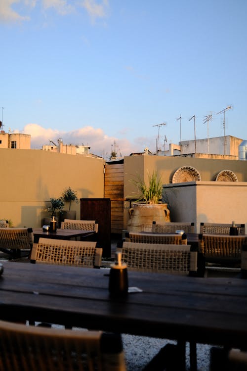 Clear Sky over Tables and Chairs