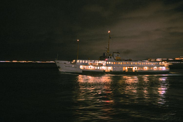 A Ship On The Sea At Night 