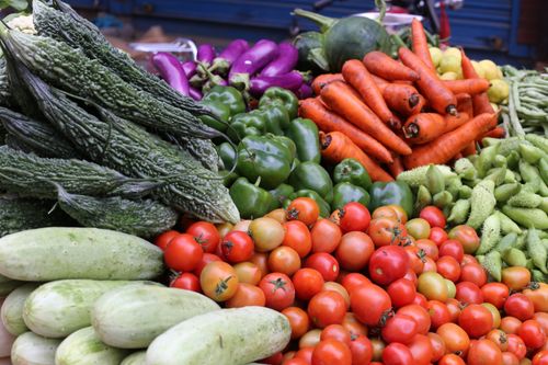 Free A colorful display of fresh vegetables at a bustling market in Kathmandu, Nepal. Stock Photo