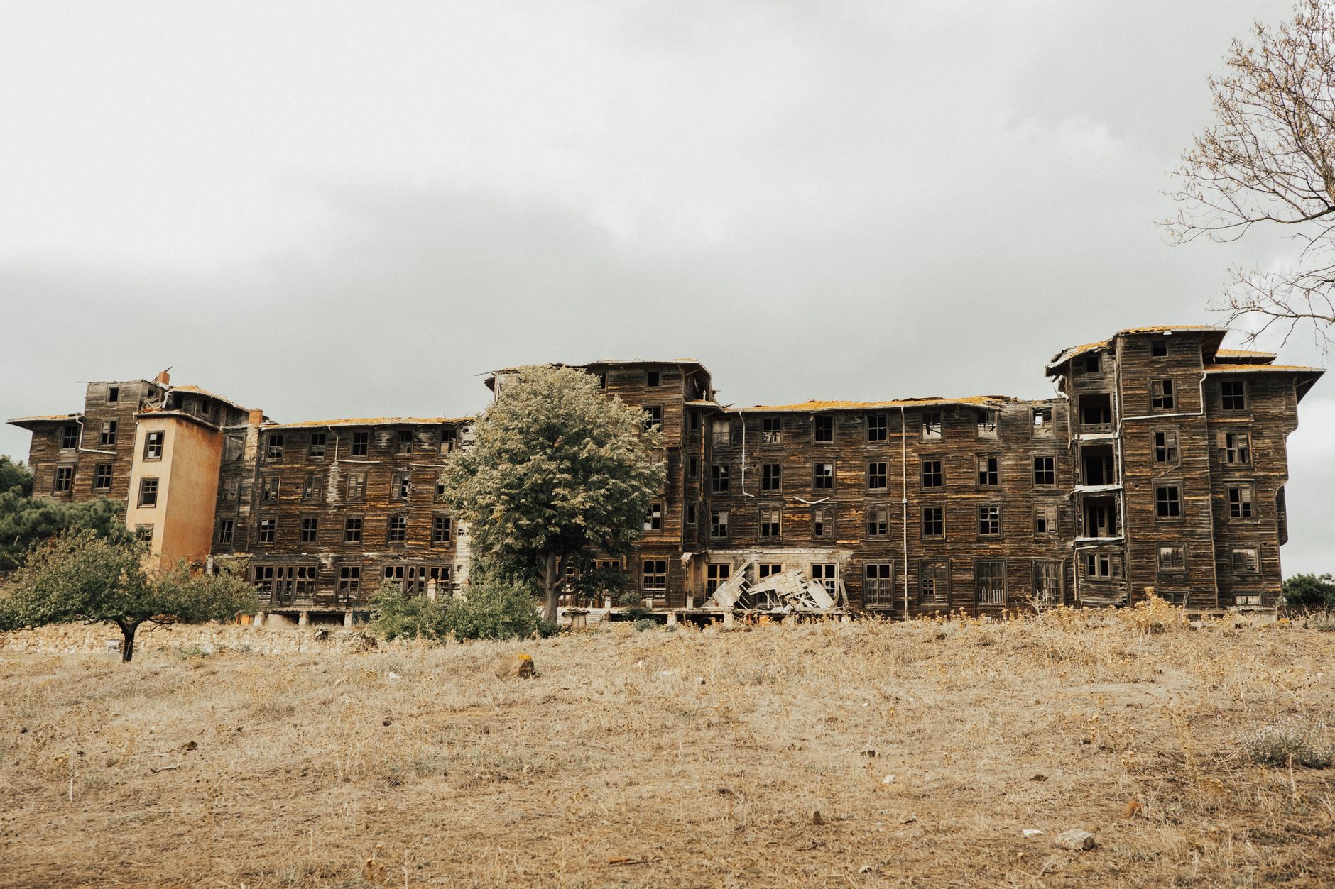 Explore the haunting beauty of an abandoned, wooden structure on Büyükada Island, Turkey.