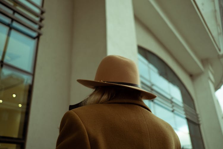 Back View Of A Person Wearing A Hat