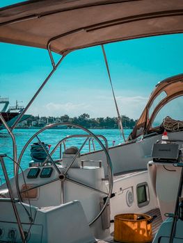 Experience tranquility aboard a luxurious yacht with ocean views and navigational gear.