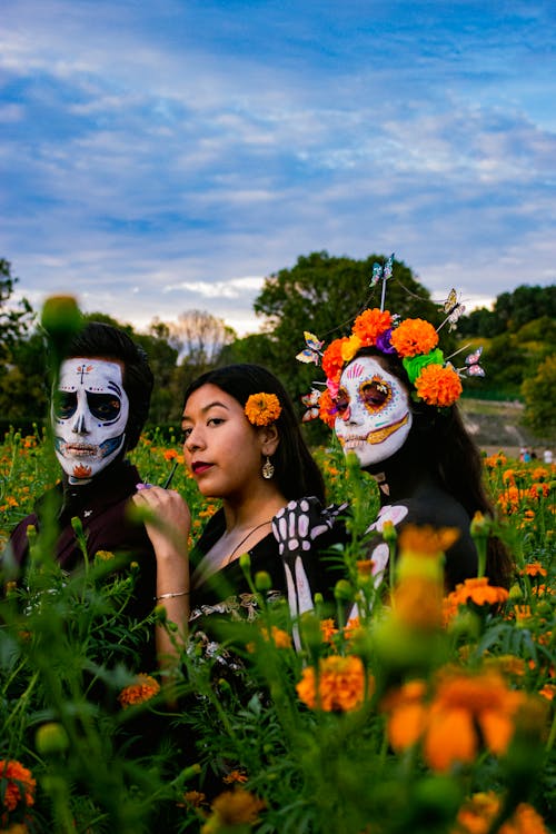 People Standing in a Flower Field