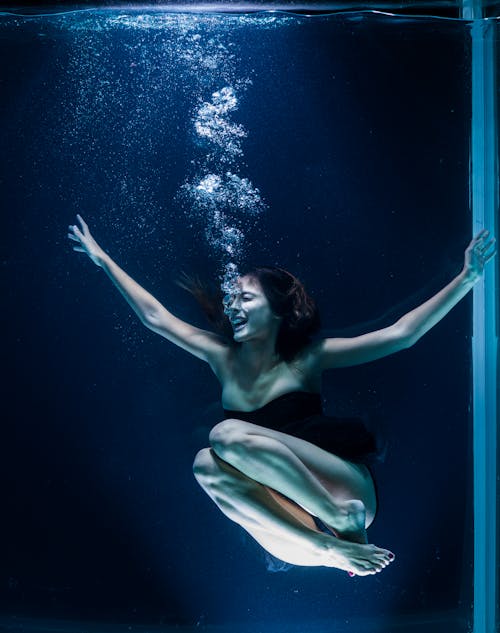 Woman Wearing Tube Dress Underwater
