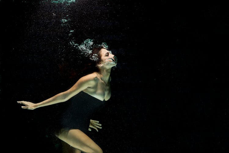 Woman Wearing Black Dress Under Water Photography