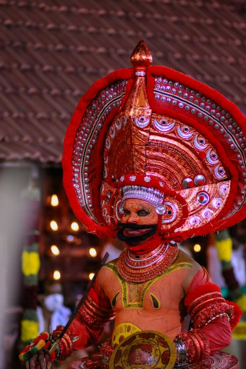 Free Vibrant depiction of a traditional theyyam performer in Kannur, showcasing Indian cultural heritage. Stock Photo