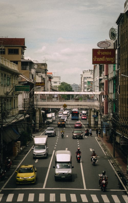 Vehicles on the Street Near Buildings