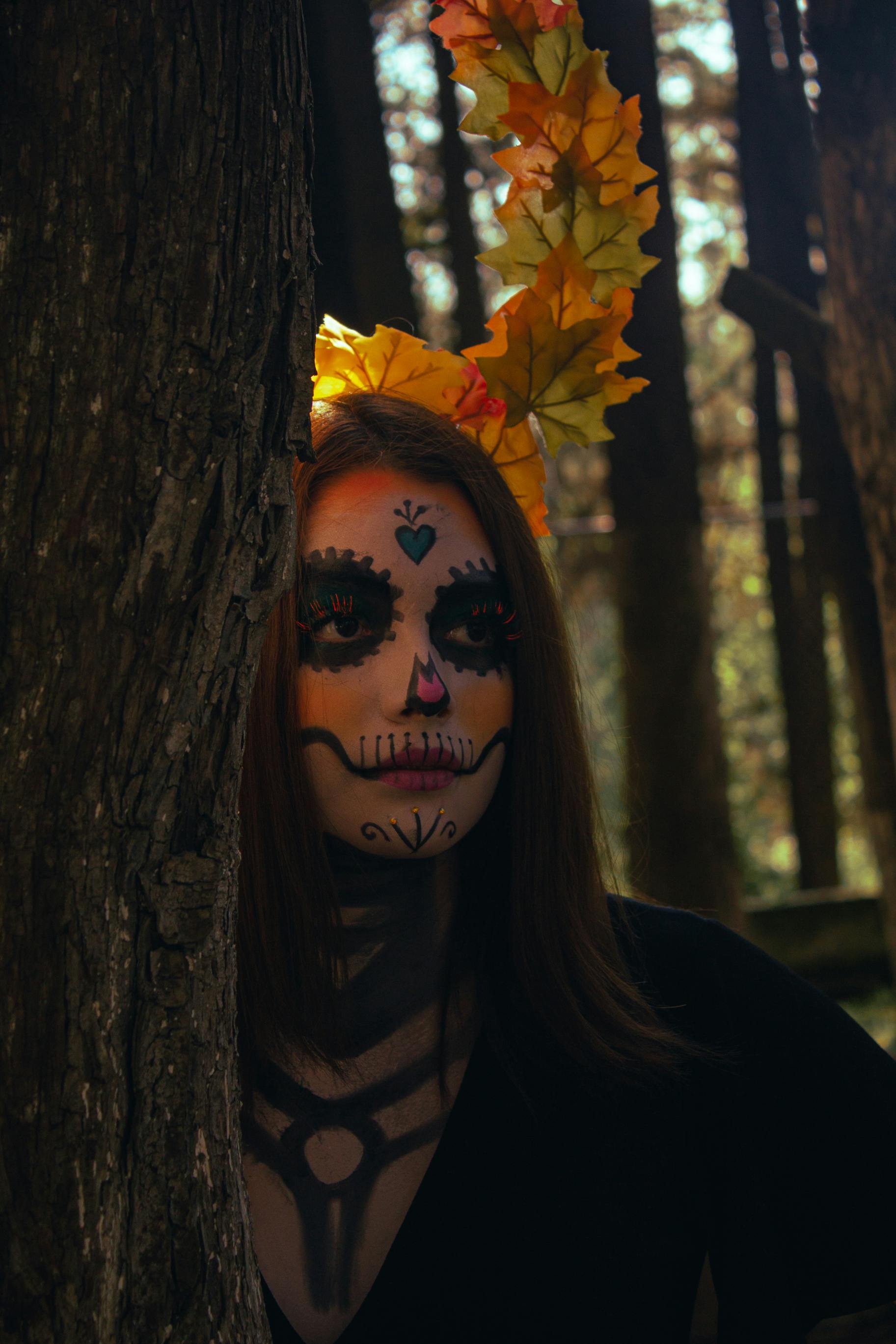 Woman with Scary Mask on Face in Forest · Free Stock Photo