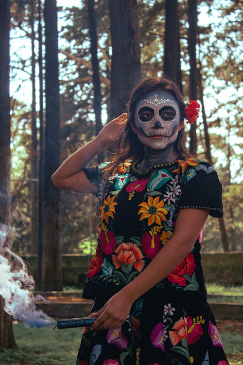 Free Woman in a Costume and Makeup for the Day of the Dead Celebration in Mexico  Stock Photo