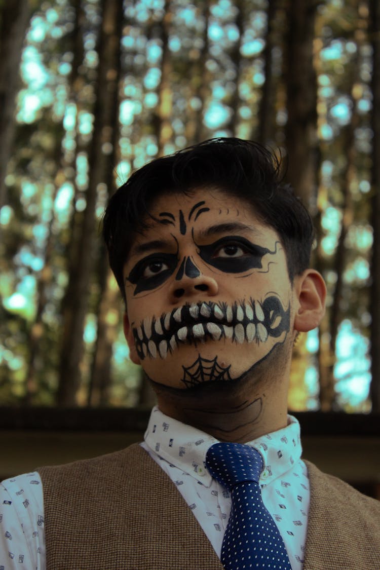 Man In A Suit And Skull Makeup 