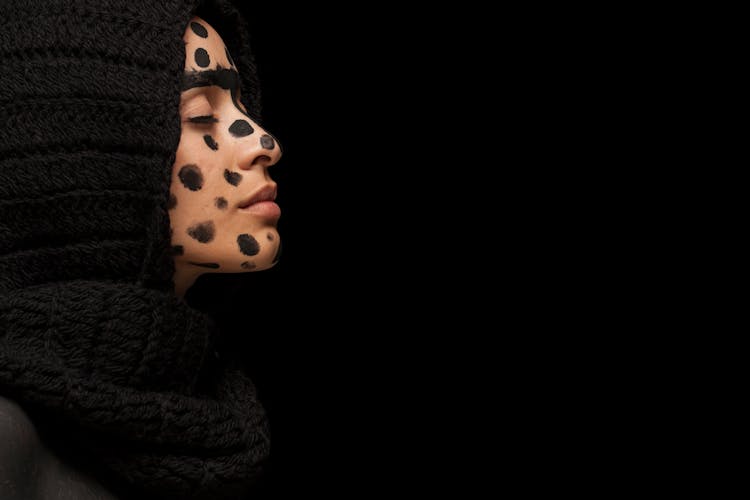 Woman With Black Dots On Face