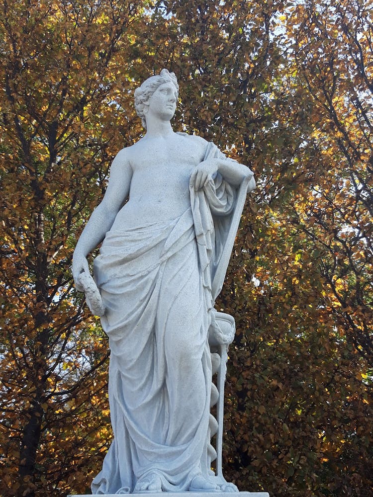 Concrete Statue Near Trees