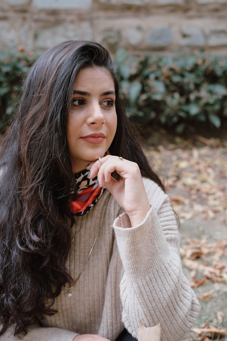 Portrait Of A Woman In A Beige Sweater