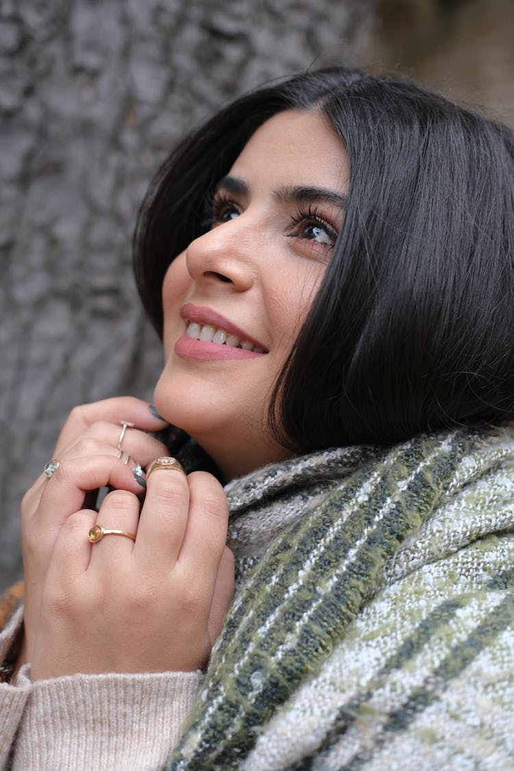 Portrait Of A Woman With Rings Smiling