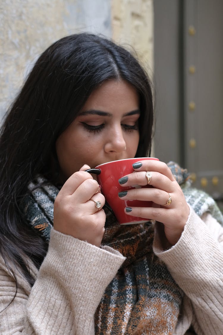 A Woman Drinking Coffee