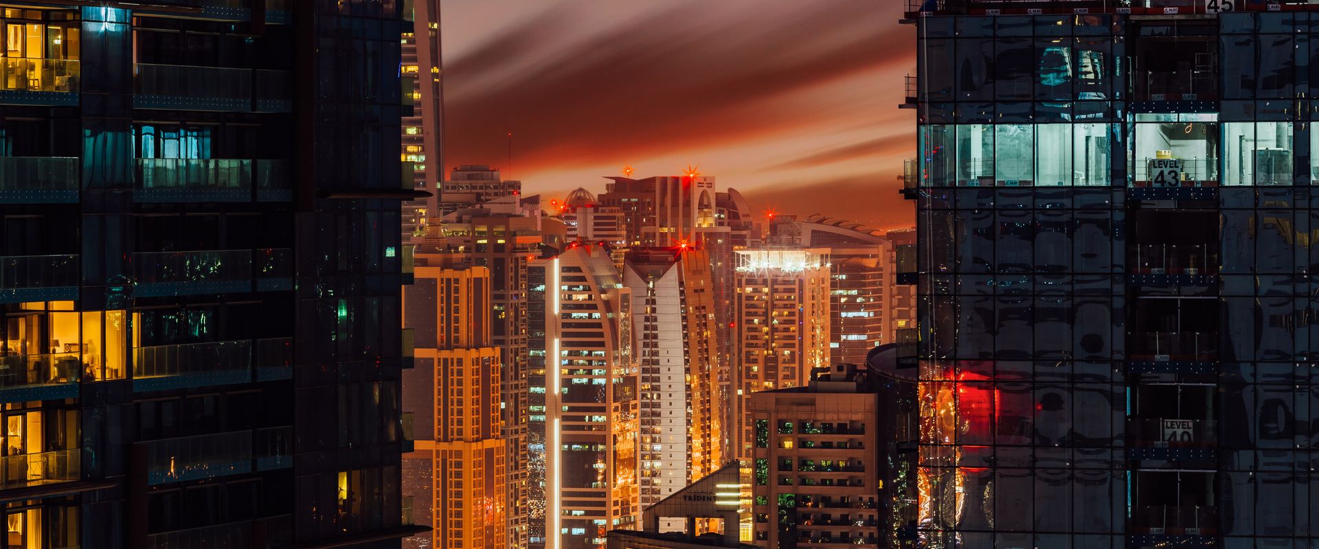 Dubai cityscape illuminated at night