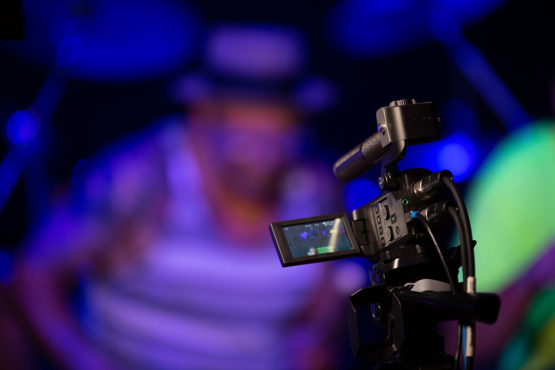 Black Video Camera Near Person