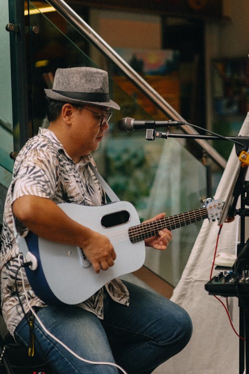 A Man Playing Guitar