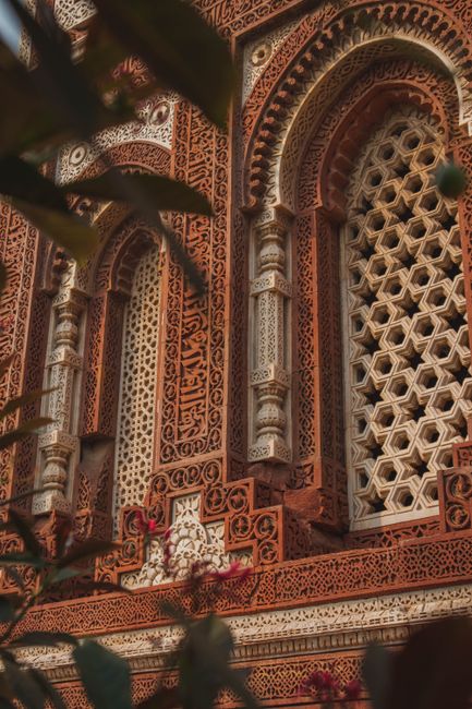 Detailed view of a traditional sandstone mosque architecture in India.