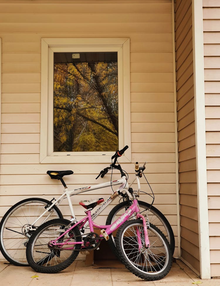 Photograph Of Bikes Near A Window