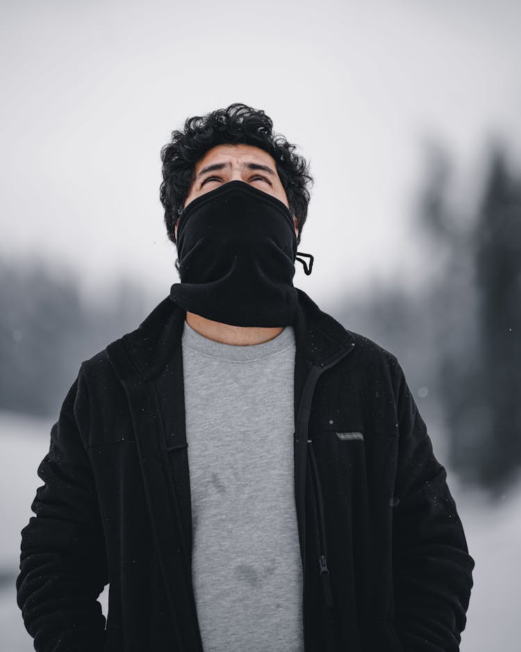 Man In Black Jacket Wearing Black Facemask