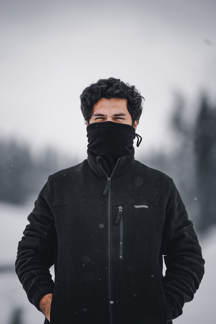 Man In Black Jacket Wearing Black Facemask