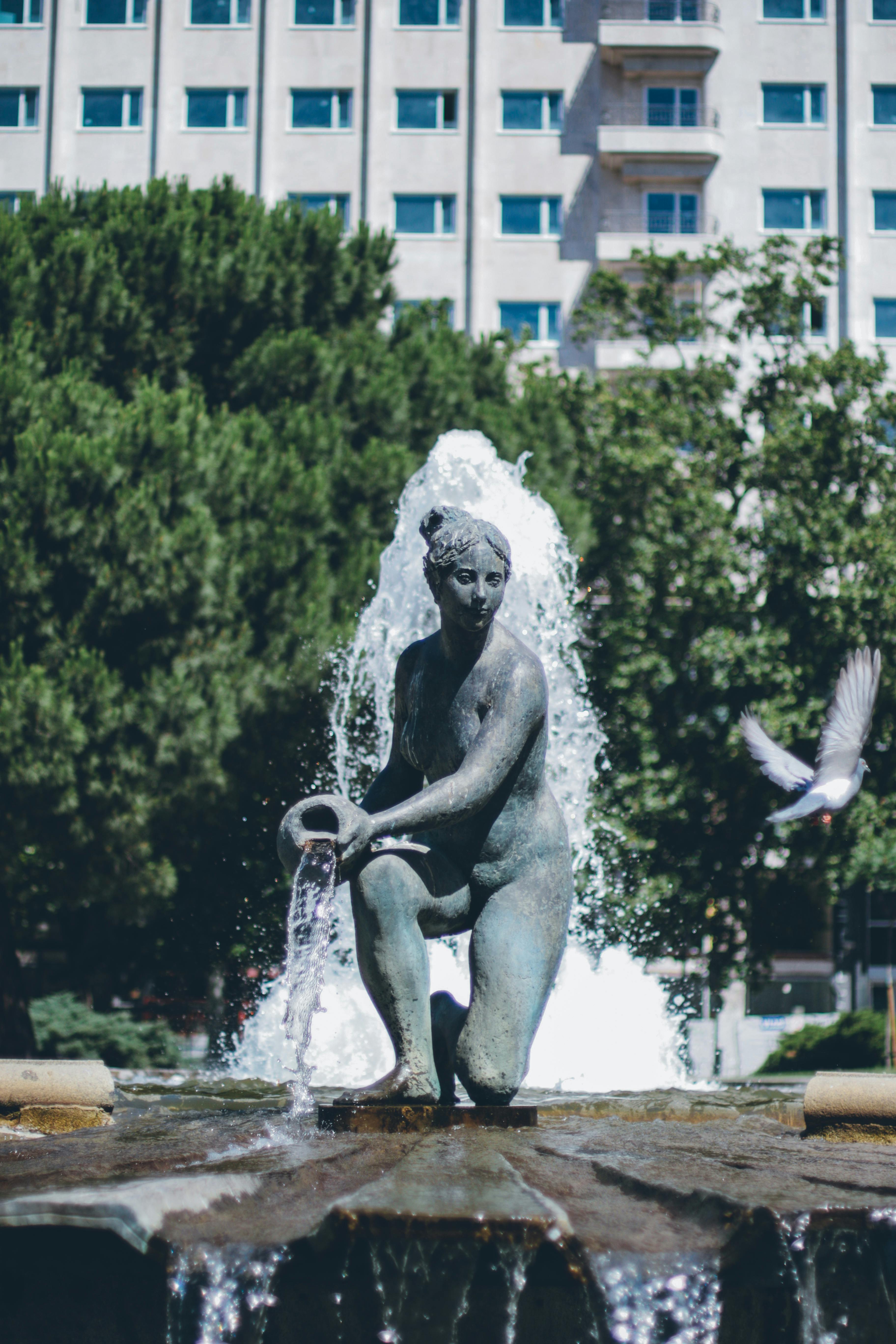 A Woman Statue in Water Fountain · Free Stock Photo