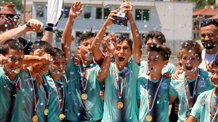 Happy Young Boys Celebrating Championship