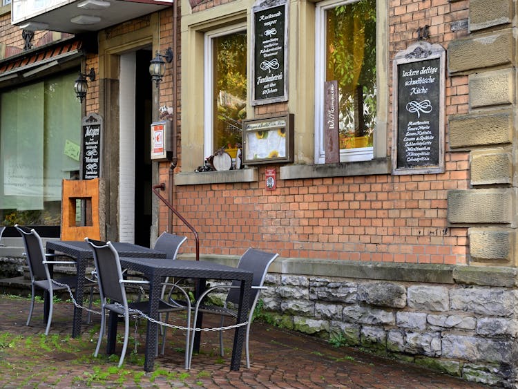 Tables And Chairs Outside A Restaurant