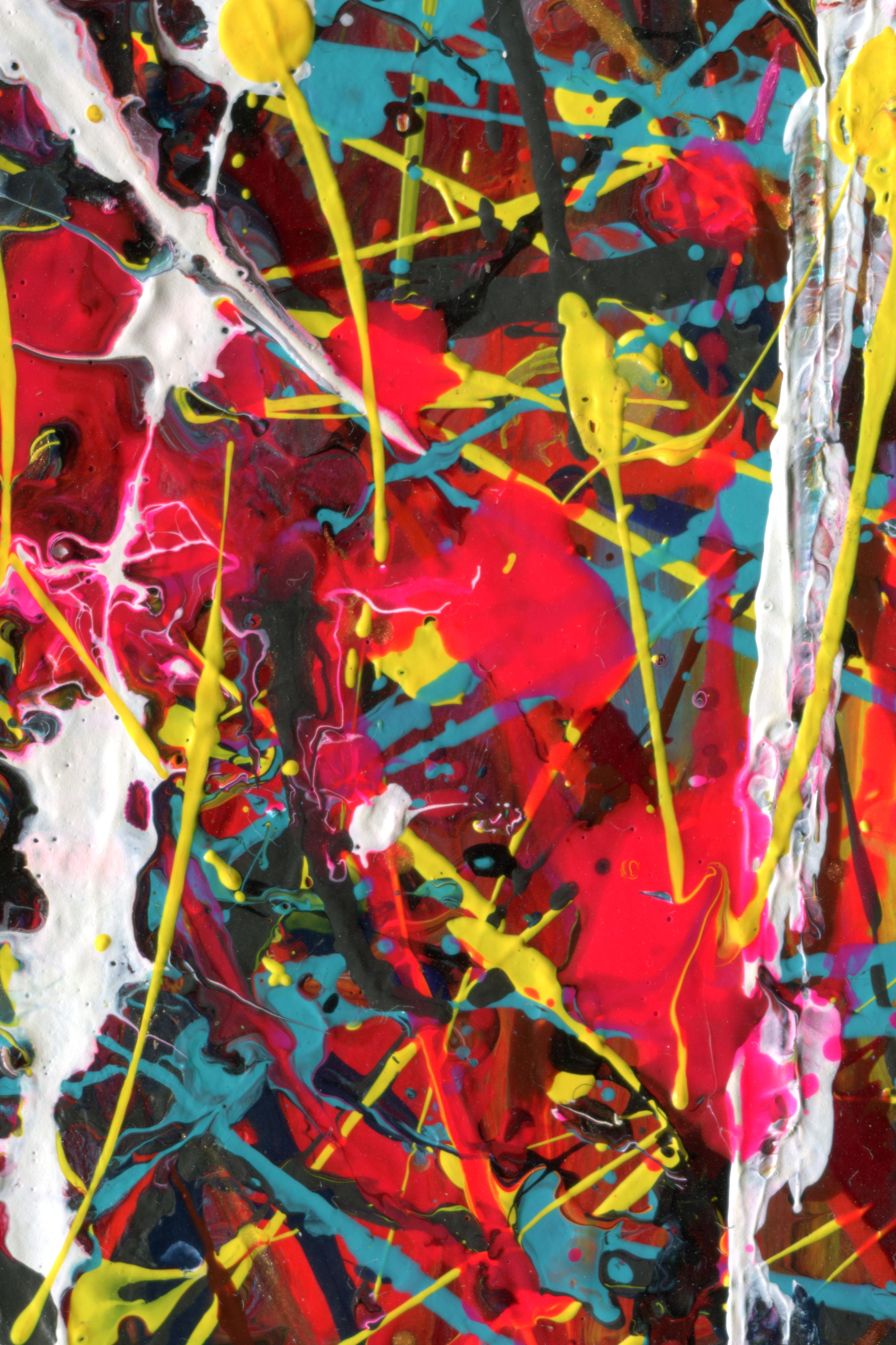 Explore a vibrant abstract acrylic painting featuring bold splashes of color and dynamic brush strokes.