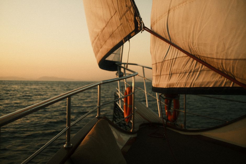Best Dubai Luxury Yacht Tour with Live BBQ & Drinks Review: An Unforgettable Experience on the Arabian Gulf Review 2026 - A serene sunset view from a sailboat on the open sea, capturing the beauty of sailing.