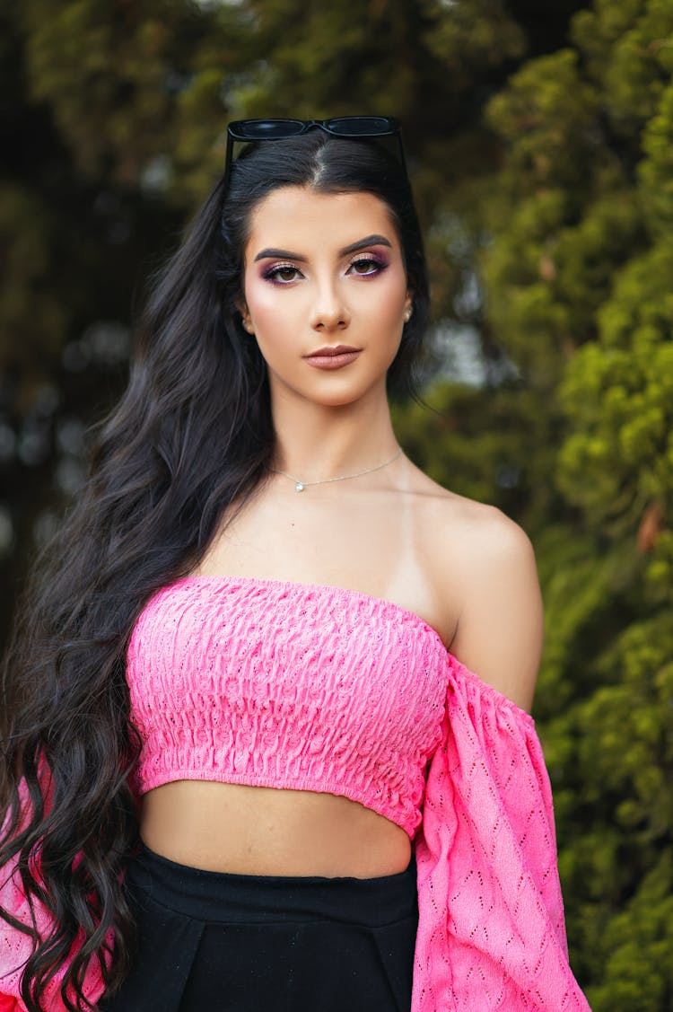 Woman In Pink Off Shoulder Blouse Staring