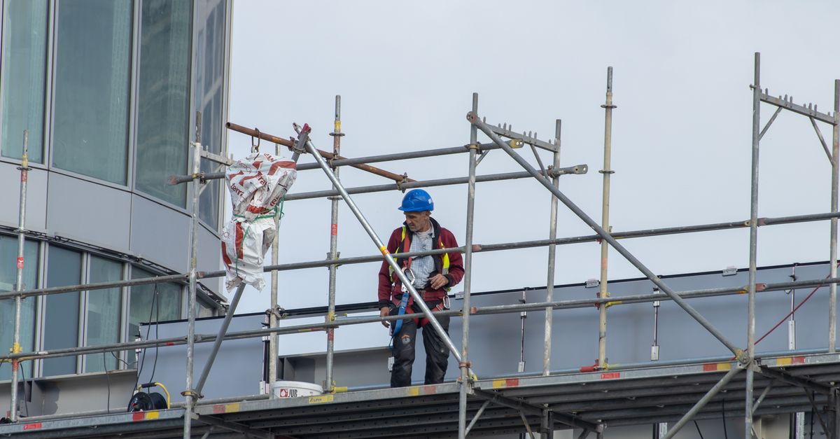 Scaffold Guys Ropes A Man Standing on Scaffolding · Free Stock Photo