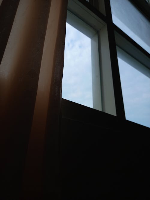Foto profissional grátis de céu, construção, janela de vidro