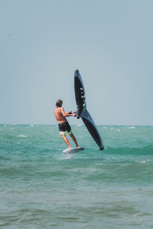 Foto profissional grátis de aventura, esporte aquático, homem