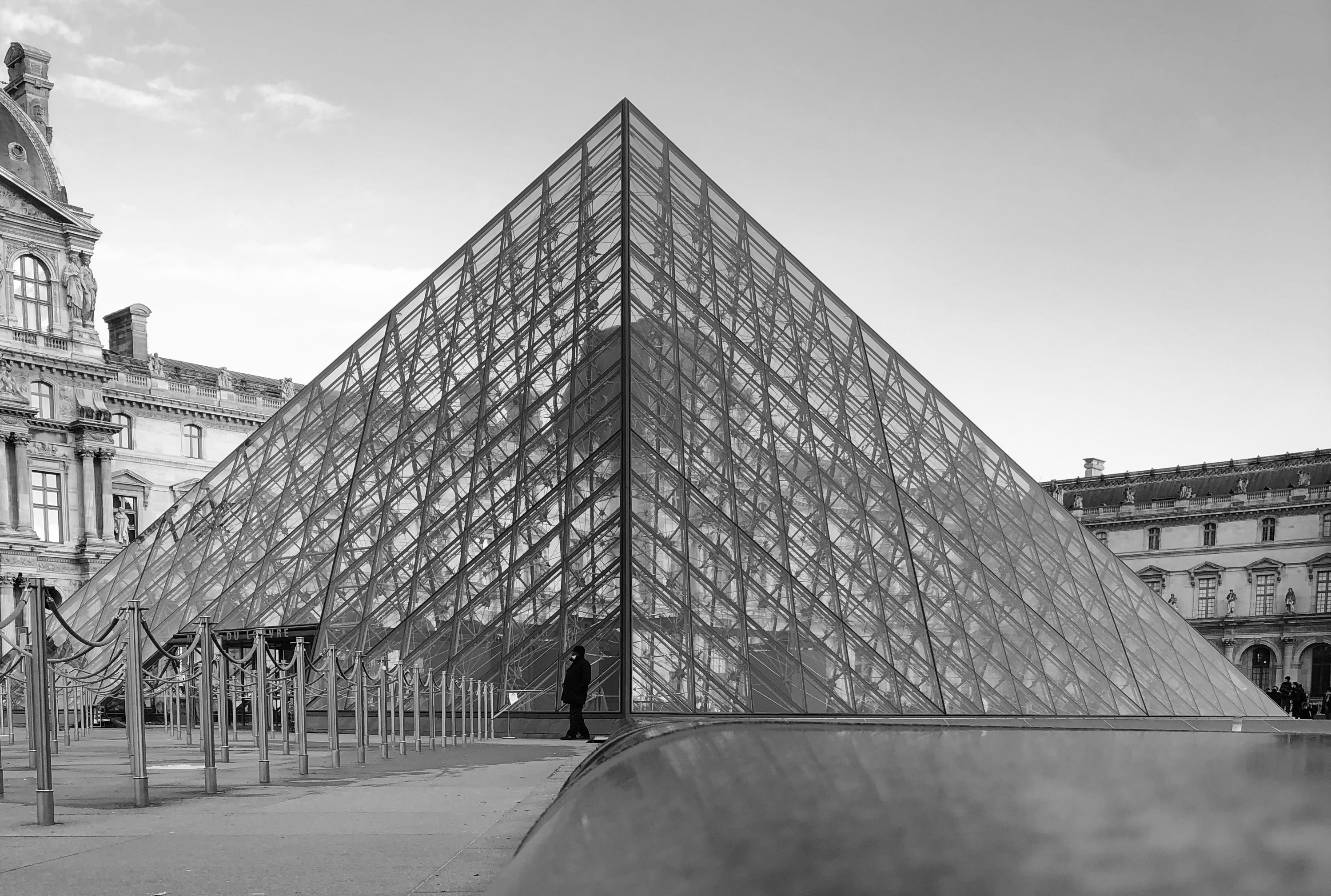 Grayscale Photo of the Louvre Pyramid · Free Stock Photo