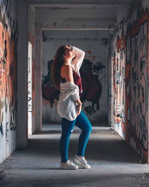 Free Woman Standing Infront of Wall Stock Photo