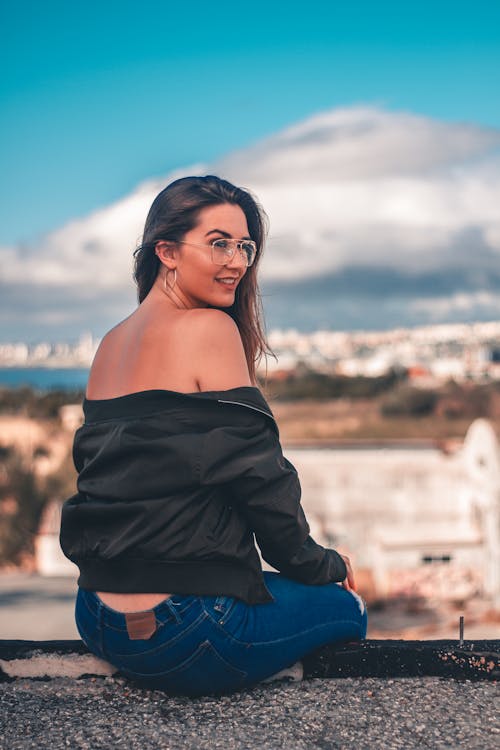 Woman Wearing Black Off-shoulder Long-sleeved Blouse