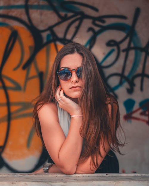 Free Woman Standing in Front of Graffiti-printed Wall Stock Photo