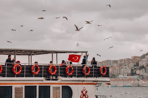 People on White Ferry Boat