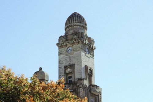 Free Explore the intricate gothic architecture of Baku's famous clock tower, a symbol of Azerbaijan's rich history. Stock Photo