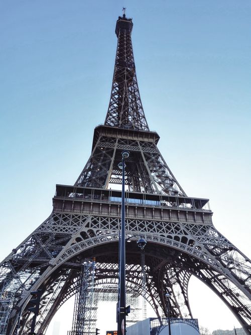 Free Stunning view of the Eiffel Tower in Paris on a clear day, showcasing its architectural beauty. Stock Photo